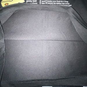 Here I'm selling a yellow, black, and white shirt from SHEIN.